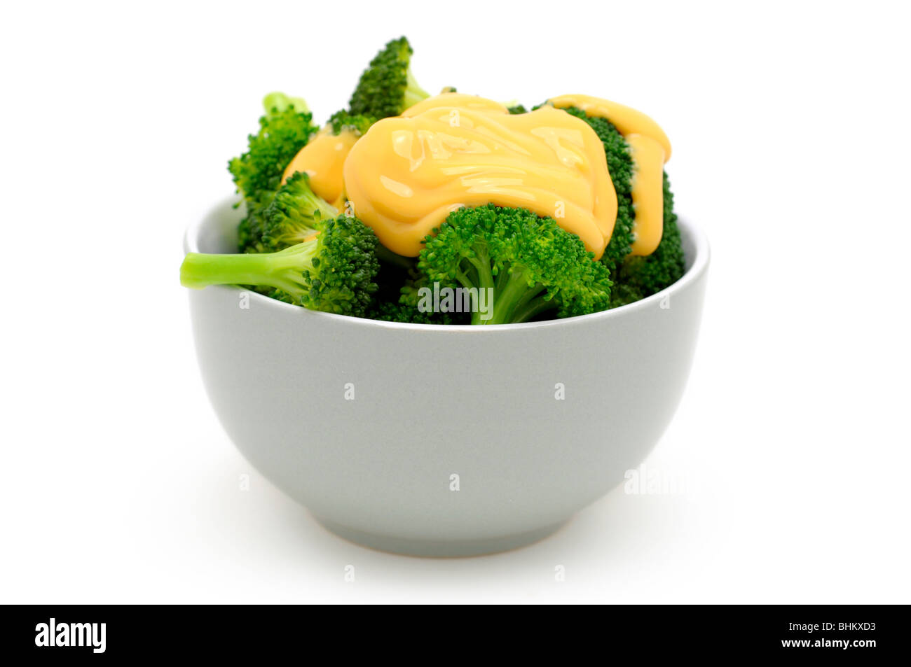 Steamed Broccoli with melted Cheddar Cheese Stock Photo