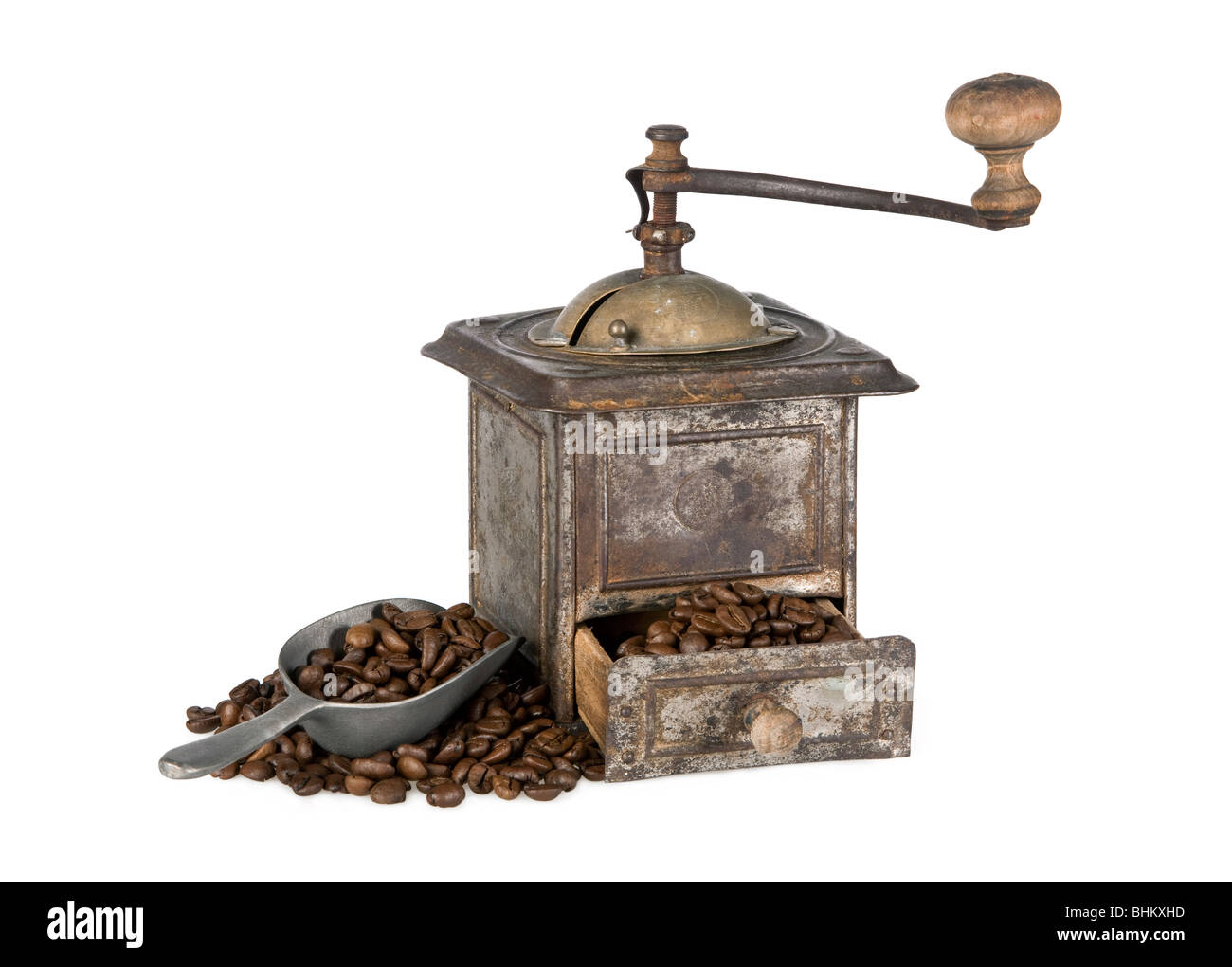 https://c8.alamy.com/comp/BHKXHD/antique-coffee-grinder-filled-with-coffee-beans-isolated-on-white-BHKXHD.jpg