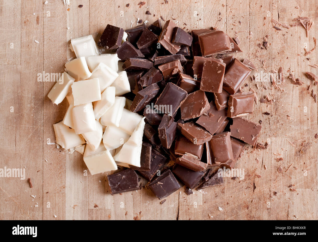Many flavors of chocolate chopped up ready for use Stock Photo