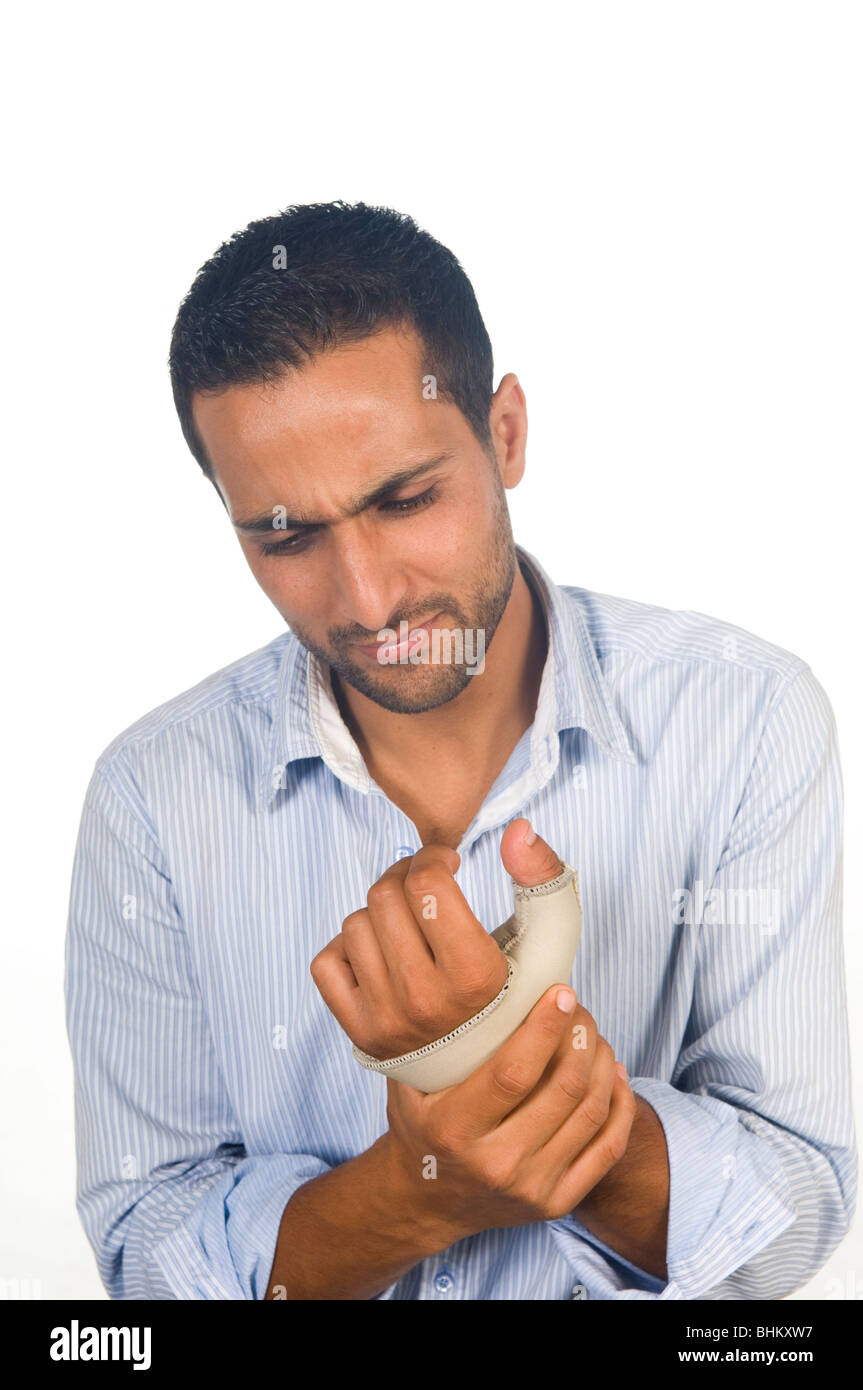 Young man wearing a splint on his broken hand Stock Photo Alamy