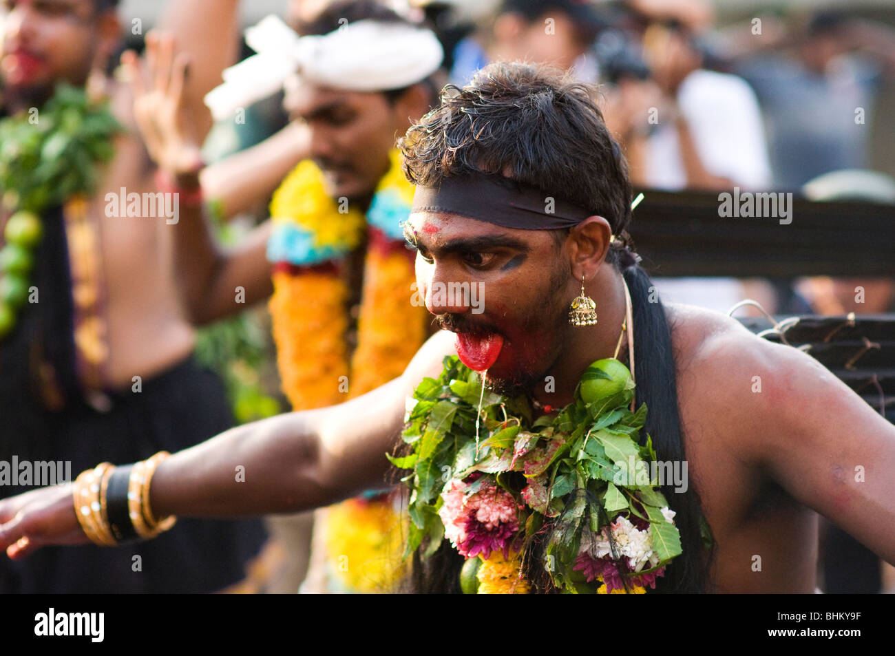 Pilgrims at thaipusam Malaysia 2010 being posessed ,Thaipusam is a Hindu festival celebrated mostly by the Tamil community. Stock Photo