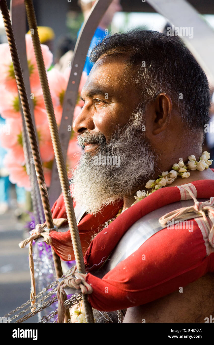 Pilgrims at thaipusam Malaysia 2010 being posessed ,Thaipusam is a Hindu festival celebrated mostly by the Tamil community. Stock Photo