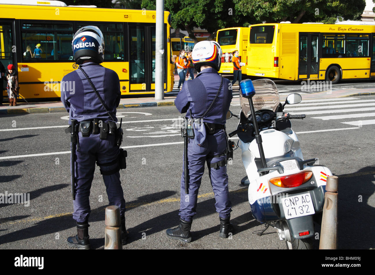 Two armed Spanish policemen (Policia Nacional) in street on Gran Canaria Stock Photo