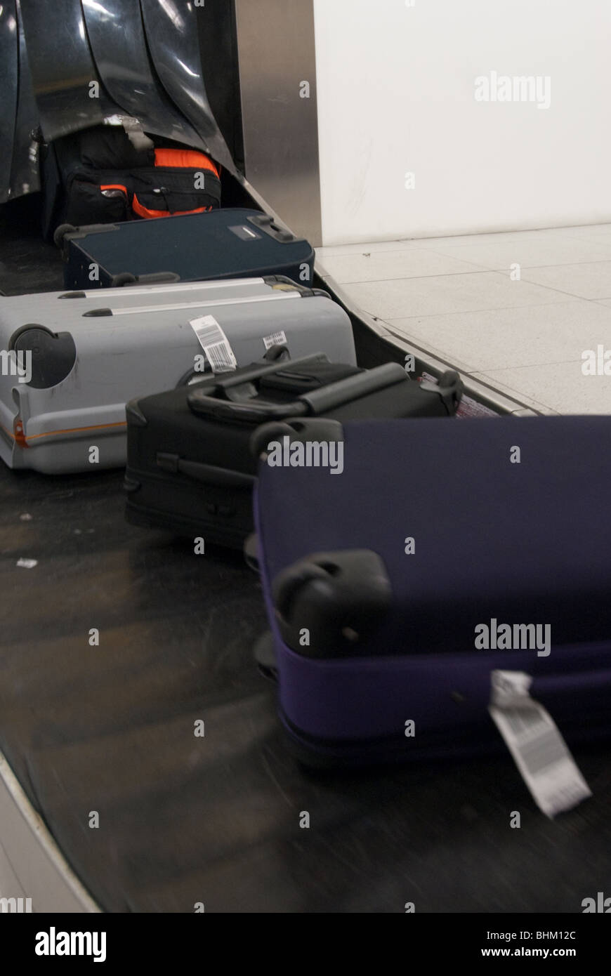 luggage on a conveyor belt Stock Photo Alamy