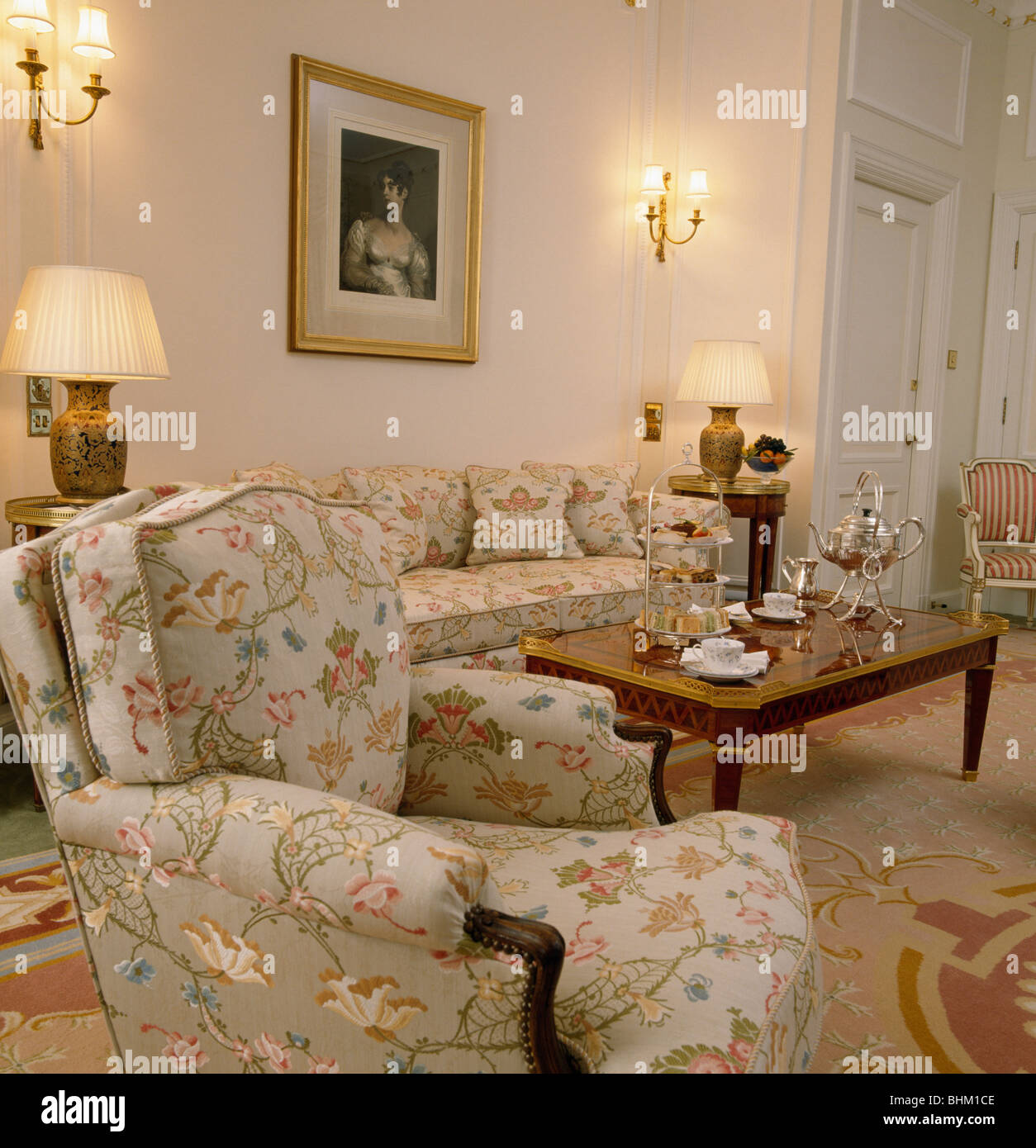 Floral Armchair And Sofa In Townhouse Drawing Room With Silver Stock Photo Alamy