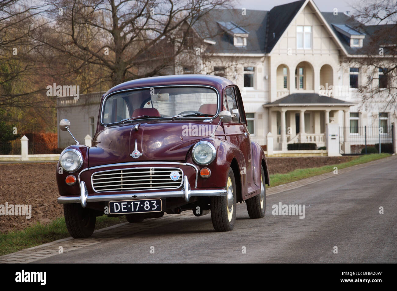 1968 Morris Minor Two Door Saloon In Maroon Red Stock Photo