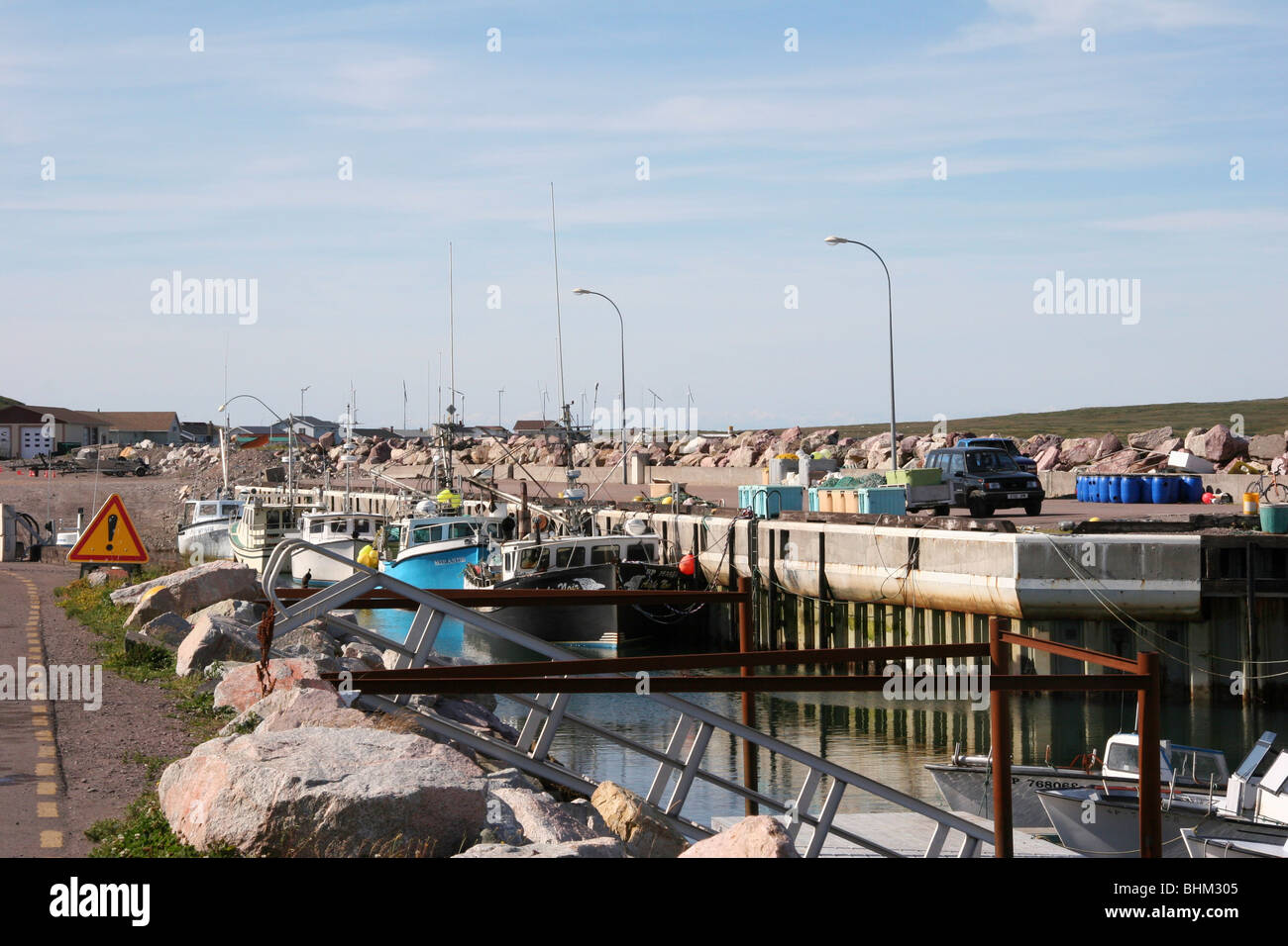 Fishing boats in the tiny harbor at Miquelon Is (France) in the Laurentian Channel S of Newfoundland Stock Photo