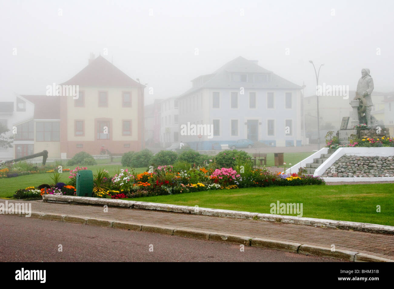 Foggy town center scene in St Pierre, SPM (France) Stock Photo