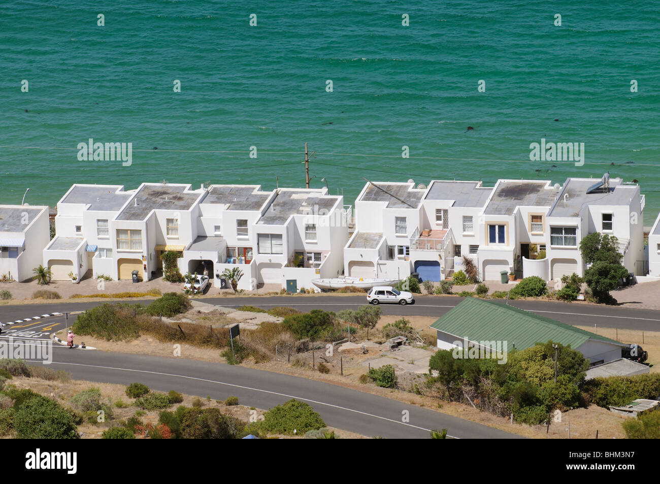 Flat roofed homes overlooking False bay at Simons Town close to Cape