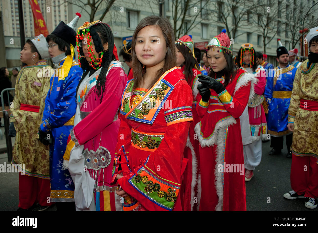 Paris, France, Large Crowd People, Chinese Women Dressed in Traditional Chinese Dresses, red chinese silk in 'Chinese New Year' Carnival in Chinatown Stock Photo