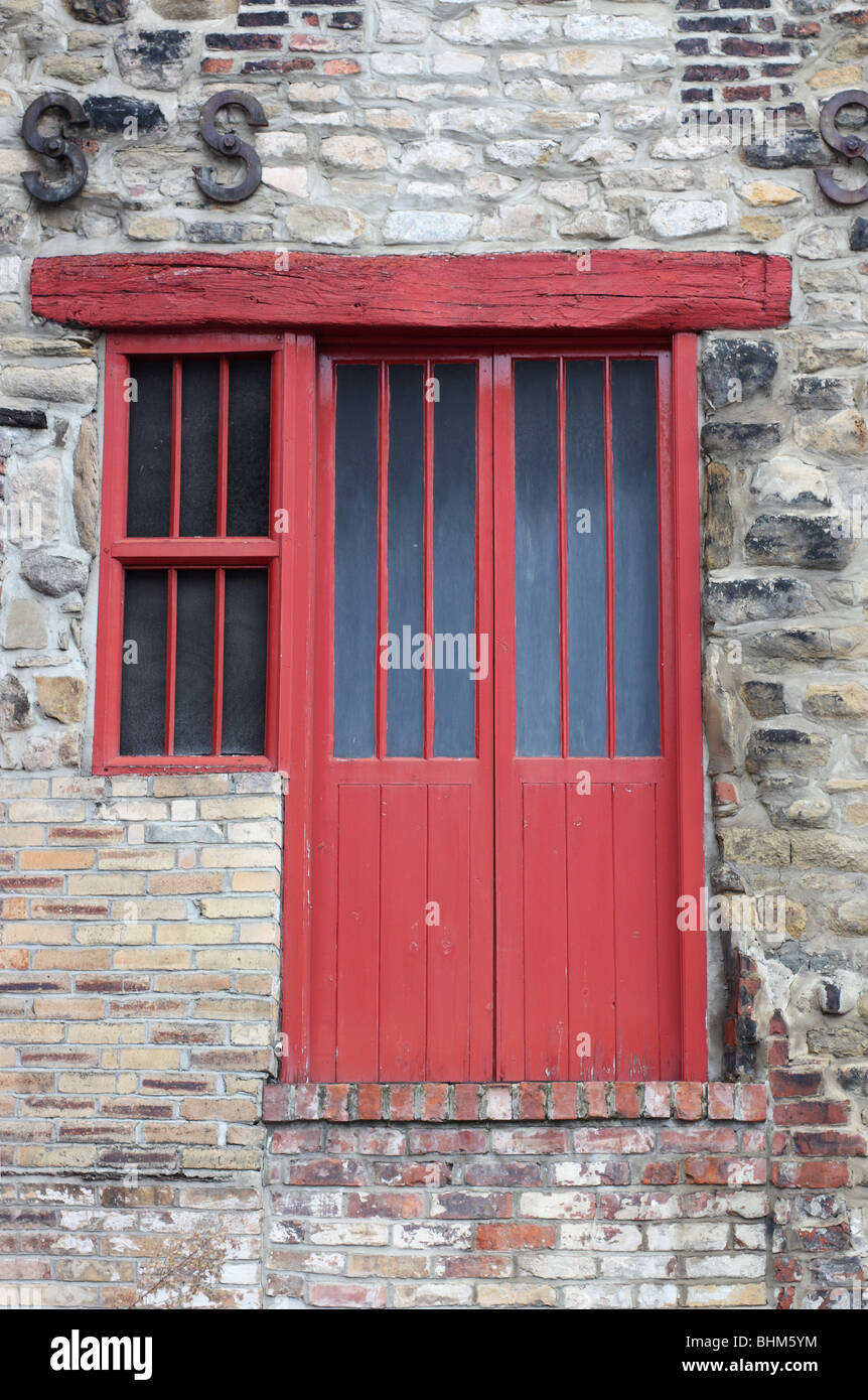 Old red door at the rear of a building in Newcastle upon Tyne