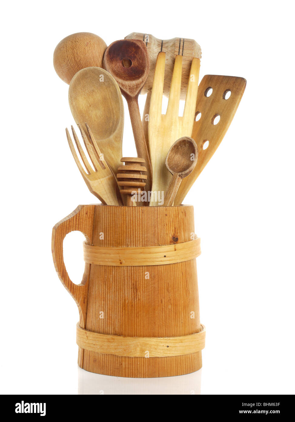 Wooden kitchen utensils over white background Stock Photo