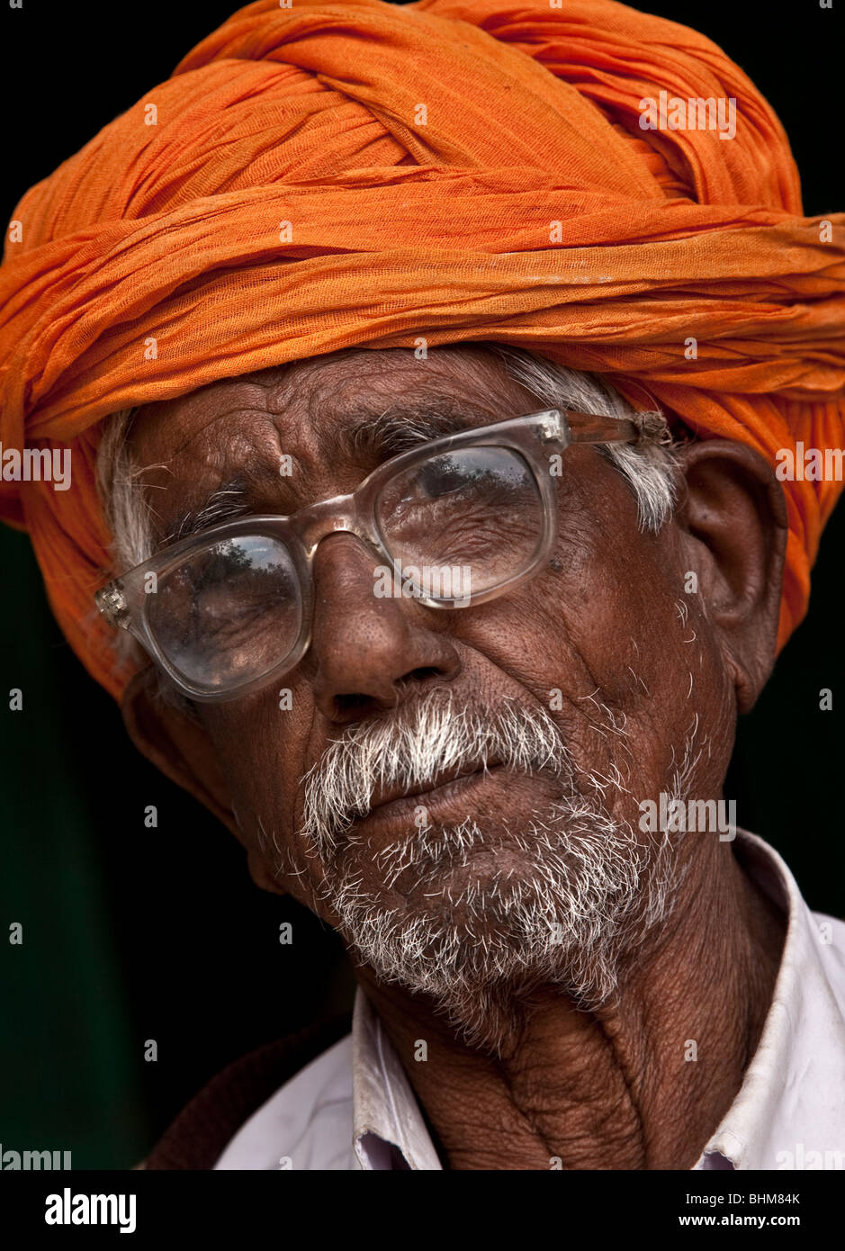 A colourfully clad Rajput man in the Sardar Bazaar in the centre of the Rajasthani city of Jodhpur, India. Stock Photo