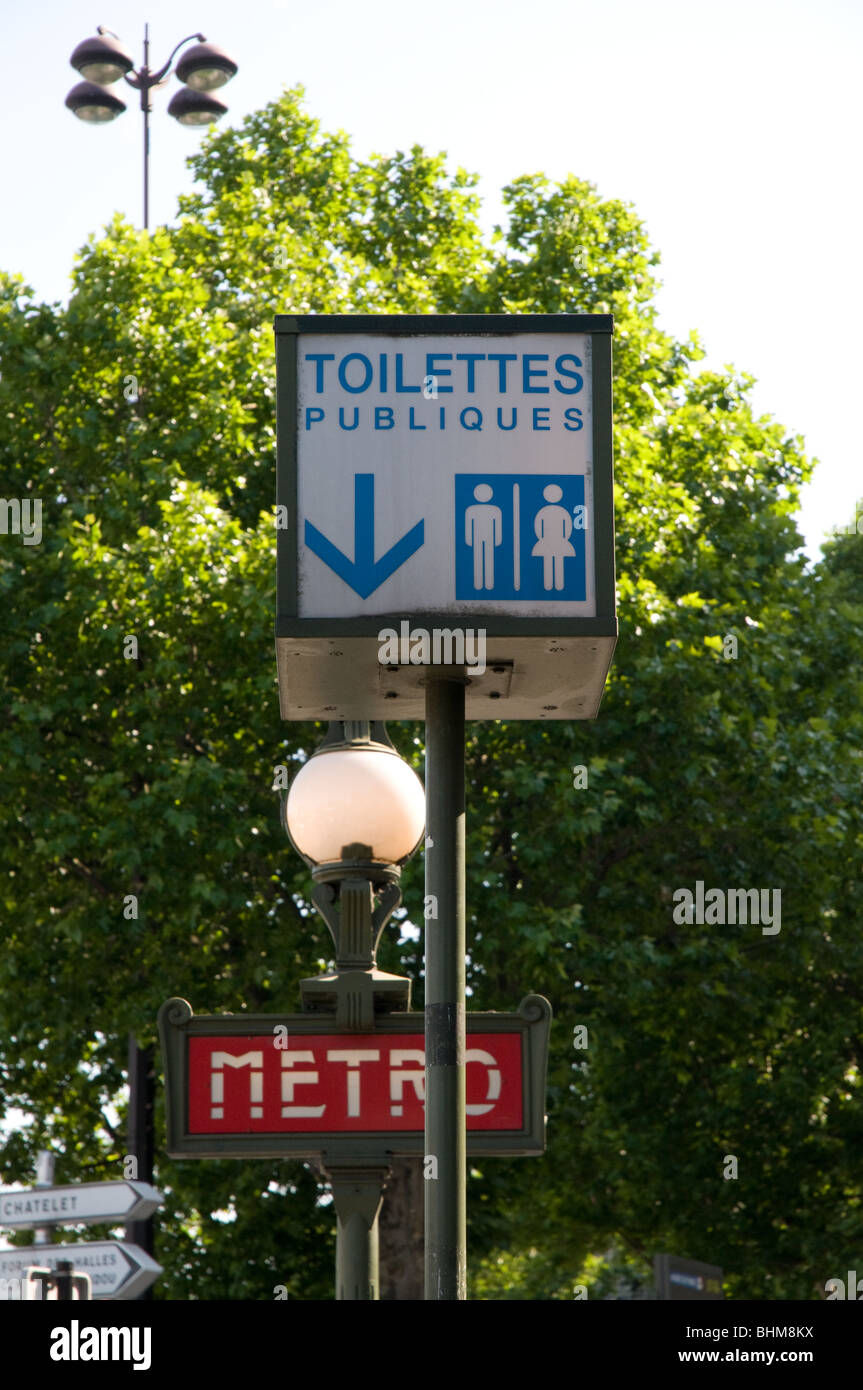 public bathrooms sign in metro (seventies style) Place de la Bastille