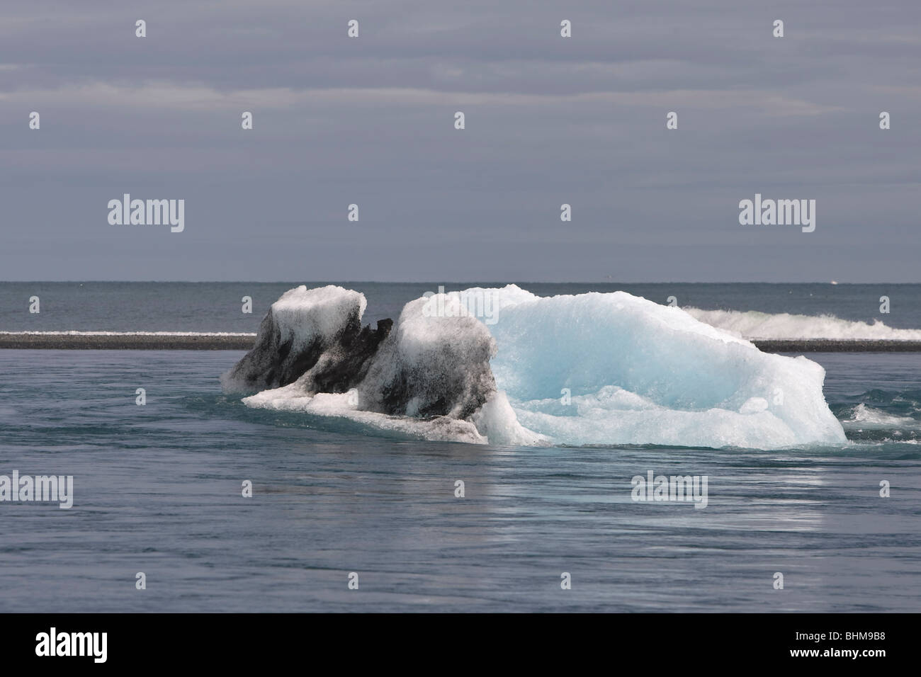 Glacier icecubes floating at the beach below Jokulsarlon, Iceland Stock Photo