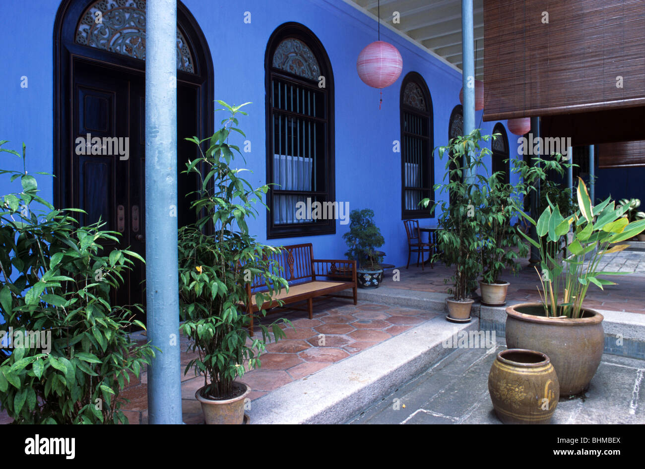 Blue Corridor & Courtyard, Cheong Fatt Tze Mansion (1870) or Straits Chinese Peranakan Court Housen Georgetown, Penang, Malaysia Stock Photo