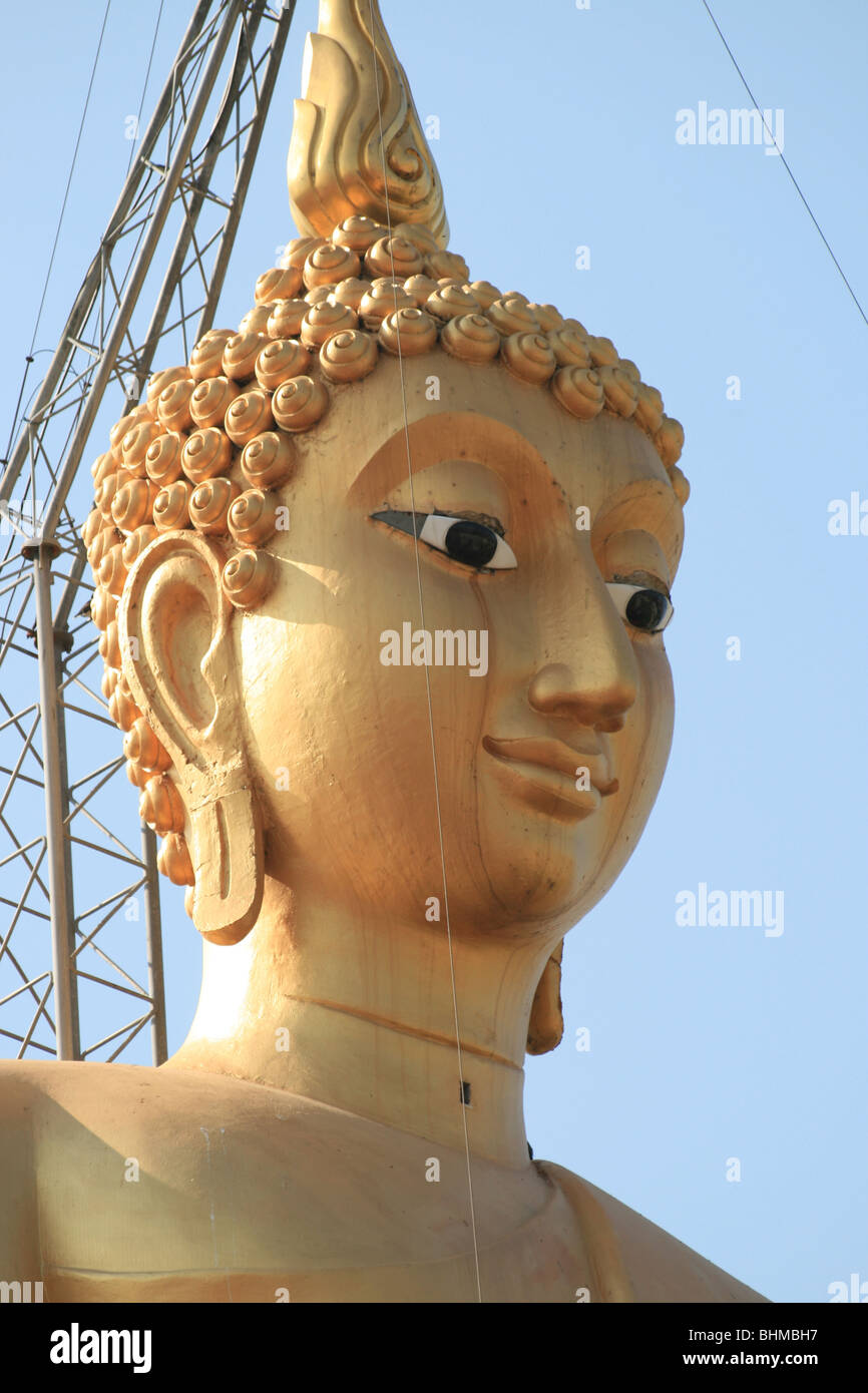 Tall gold Buddha statue against blue sky , Bangkok , Thailand Stock ...
