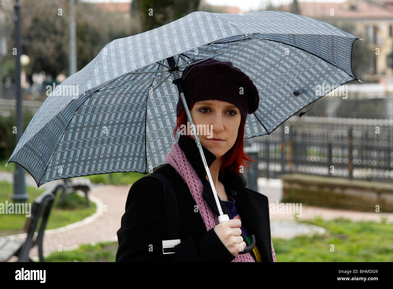 Woman with umbrella Stock Photo