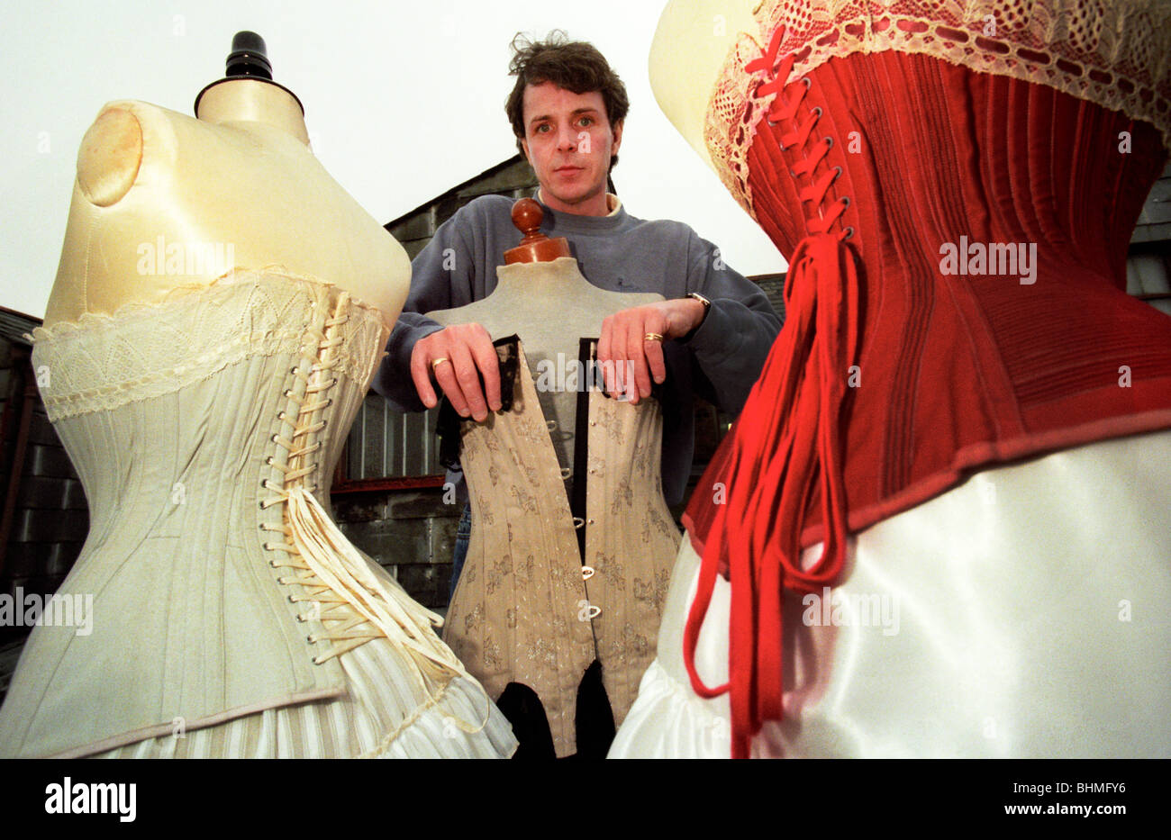 Ian Voller owner of Voller Corsets in Portsmouth the oldest corset makers  in the UK with old and modern corsets Stock Photo - Alamy