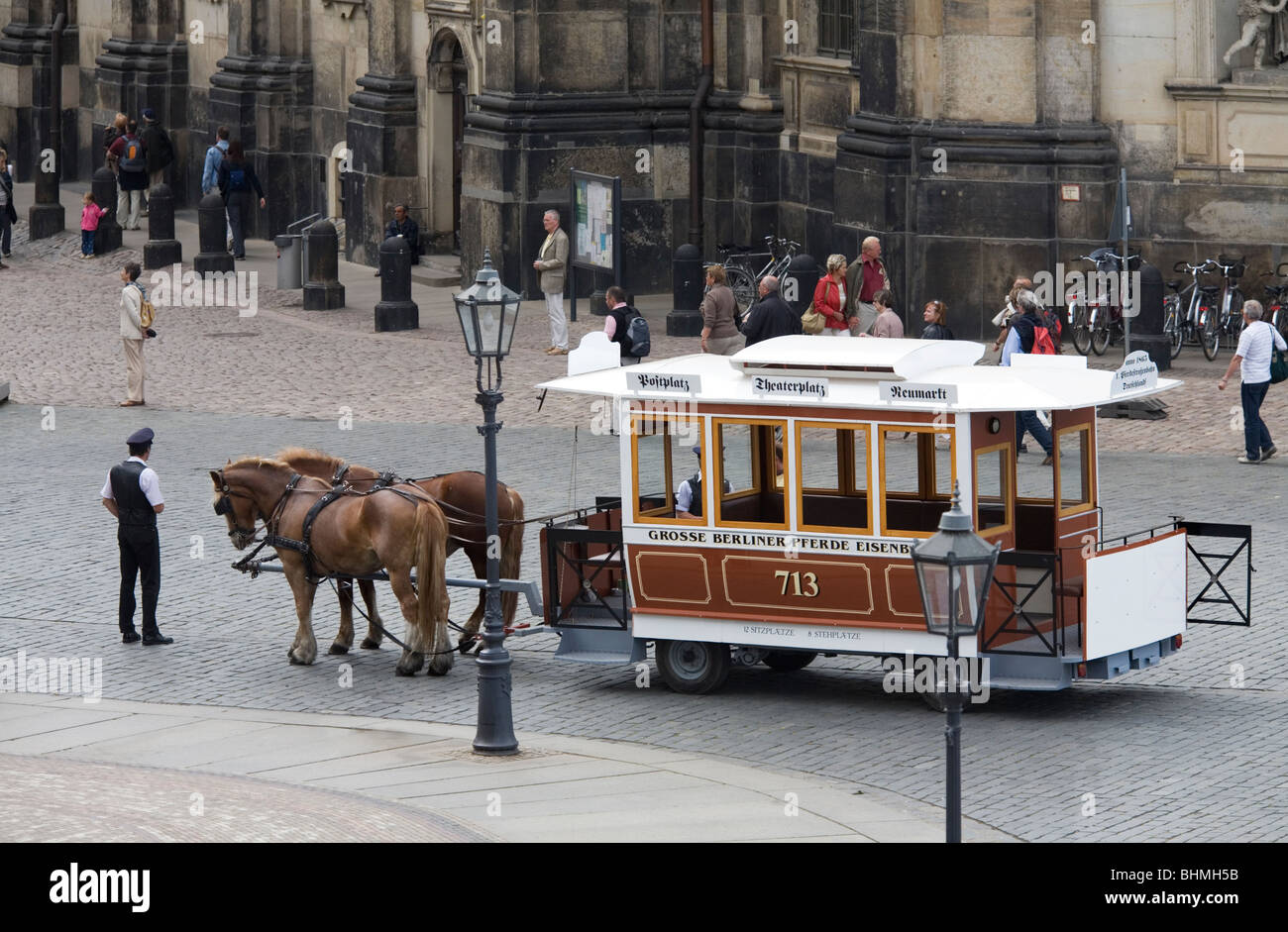 A Horse Drawn tram in front of the Cathedral, Dresden, Germany Stock Photo