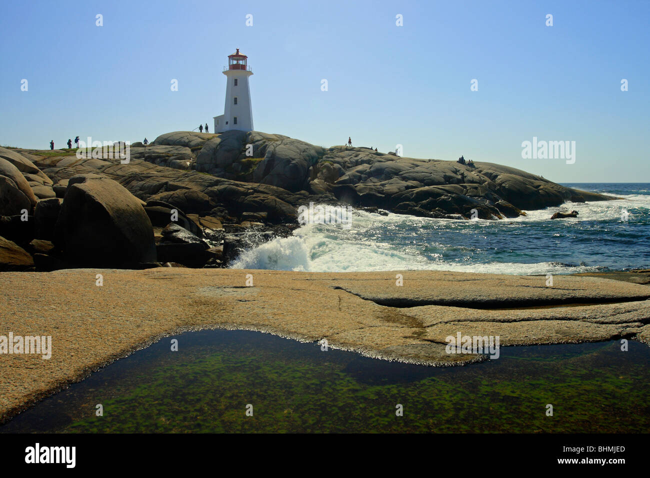 Peggy's Point or Cove or Peggys Cove Lighthouse in Nova Scotia Canada showing a tide pool Stock