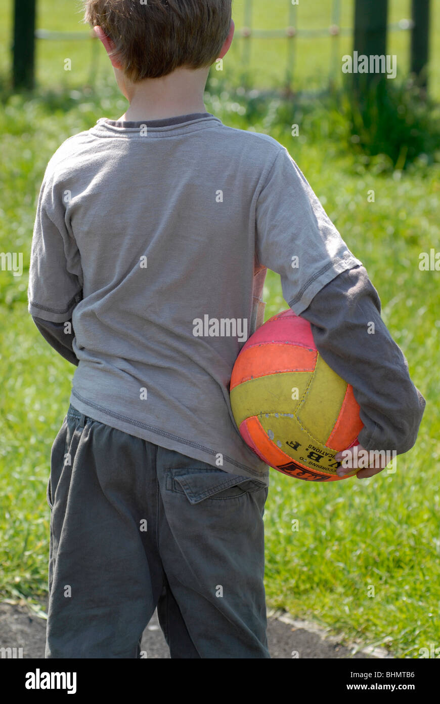 Boy playing park hi-res stock photography and images - Alamy