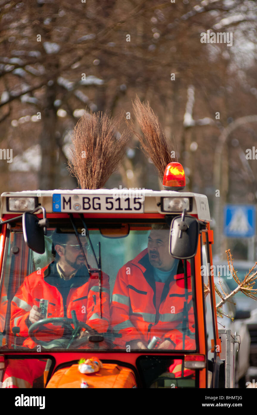 Snow plow workers closeup in Munich, Germany Stock Photo Alamy