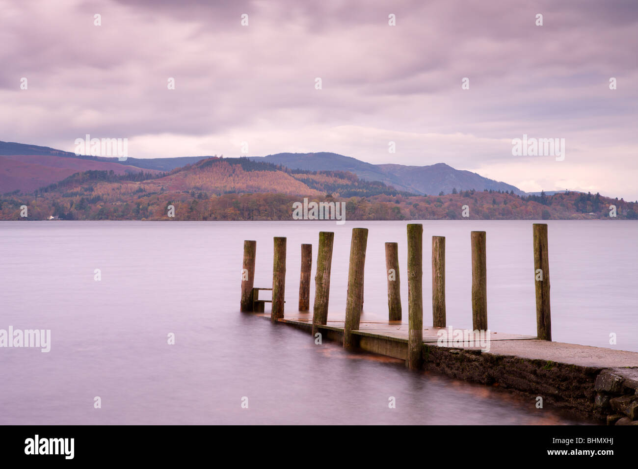 Wooden jetty on the shores of Derwent Water, Lake District National Park, Cumbria, England, UK. Autumn (November) 2009 Stock Photo