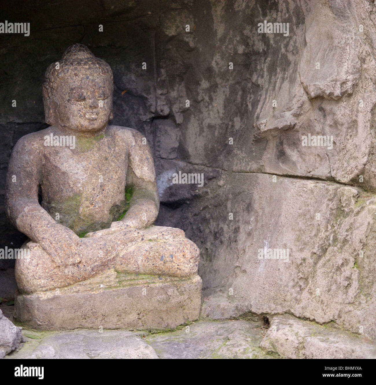 STONE BUDDHA STATUE IN A NICHE Stock Photo Alamy