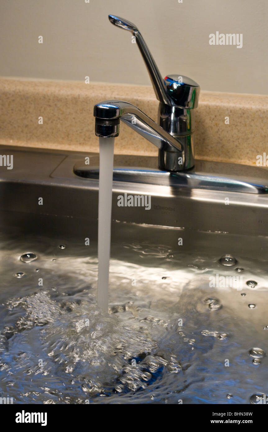 Kitchen Sink Filling With Water Stock Photo Alamy