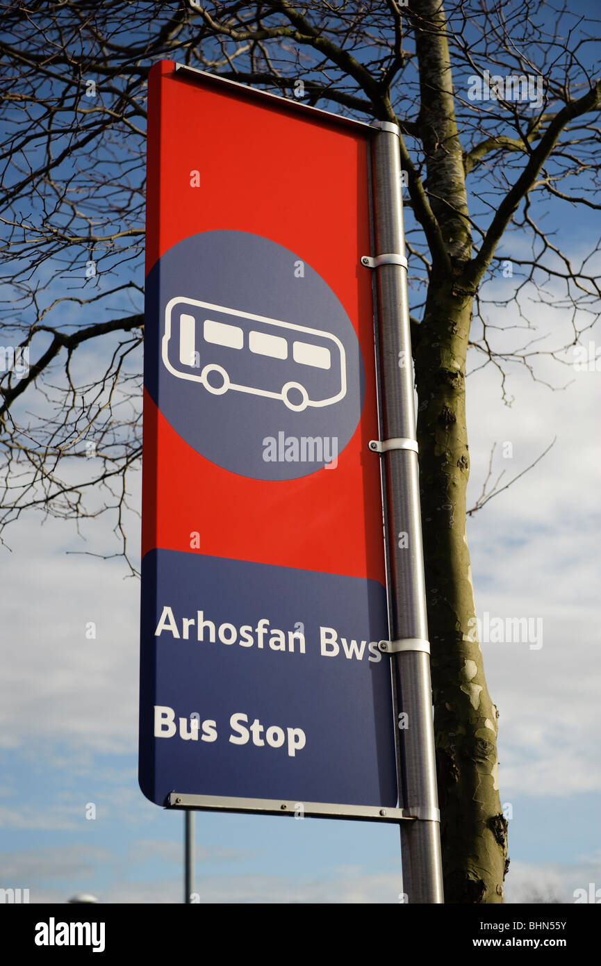 Bilingual Welsh English bus stop sign, Wales UK Stock Photo