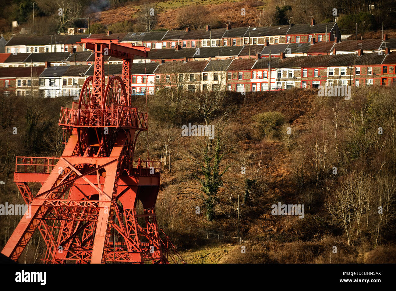 The old Lewis Merthyr pit head winding gear at the Rhondda Heritage Park coal mining museum Trehafod Rhondda Valley South Wales Stock Photo