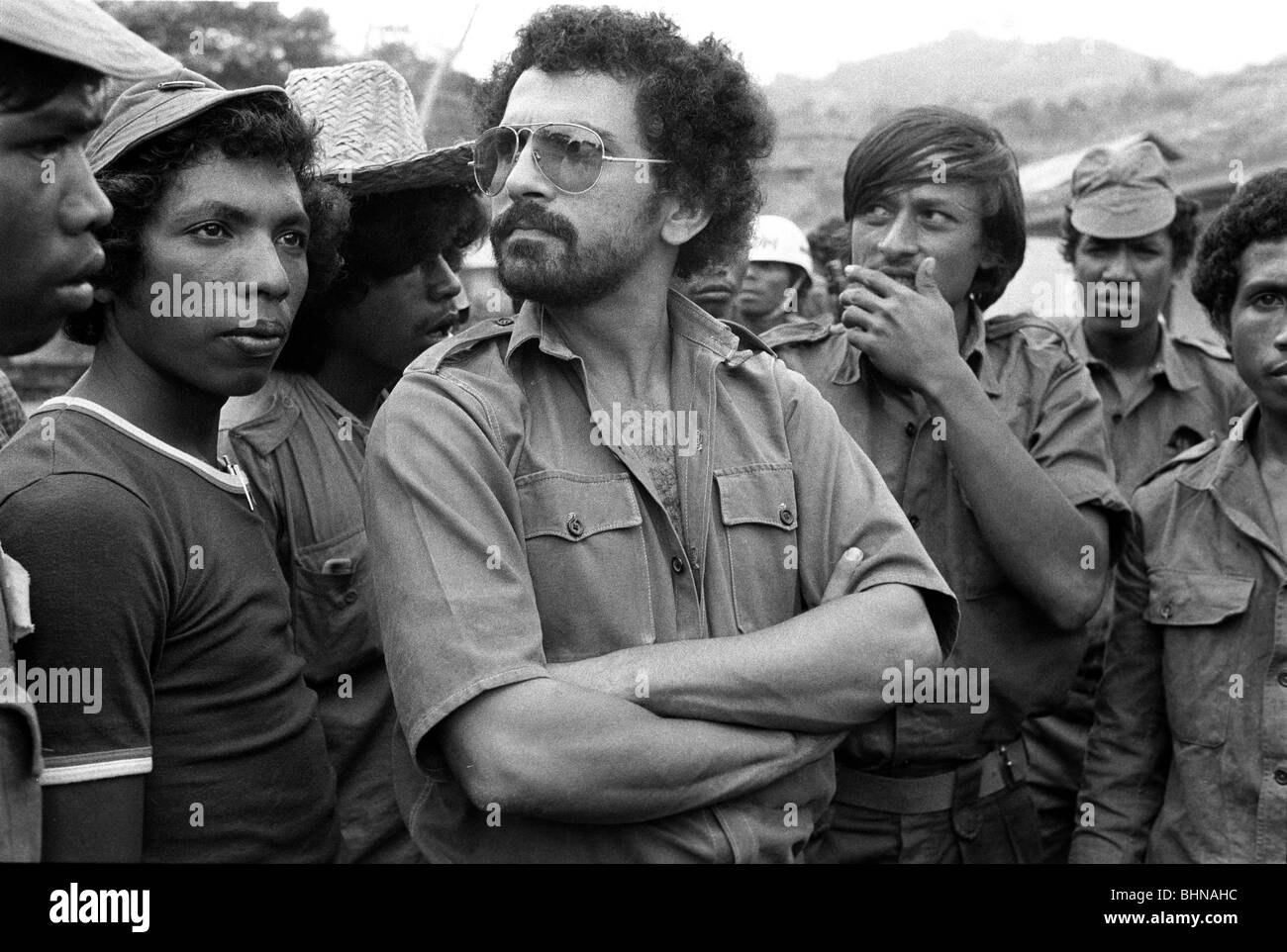 Jose Ramos-Horta with group of young supporters and freedom fighters in western mountains East Timor as Indonesian troops invade Stock Photo