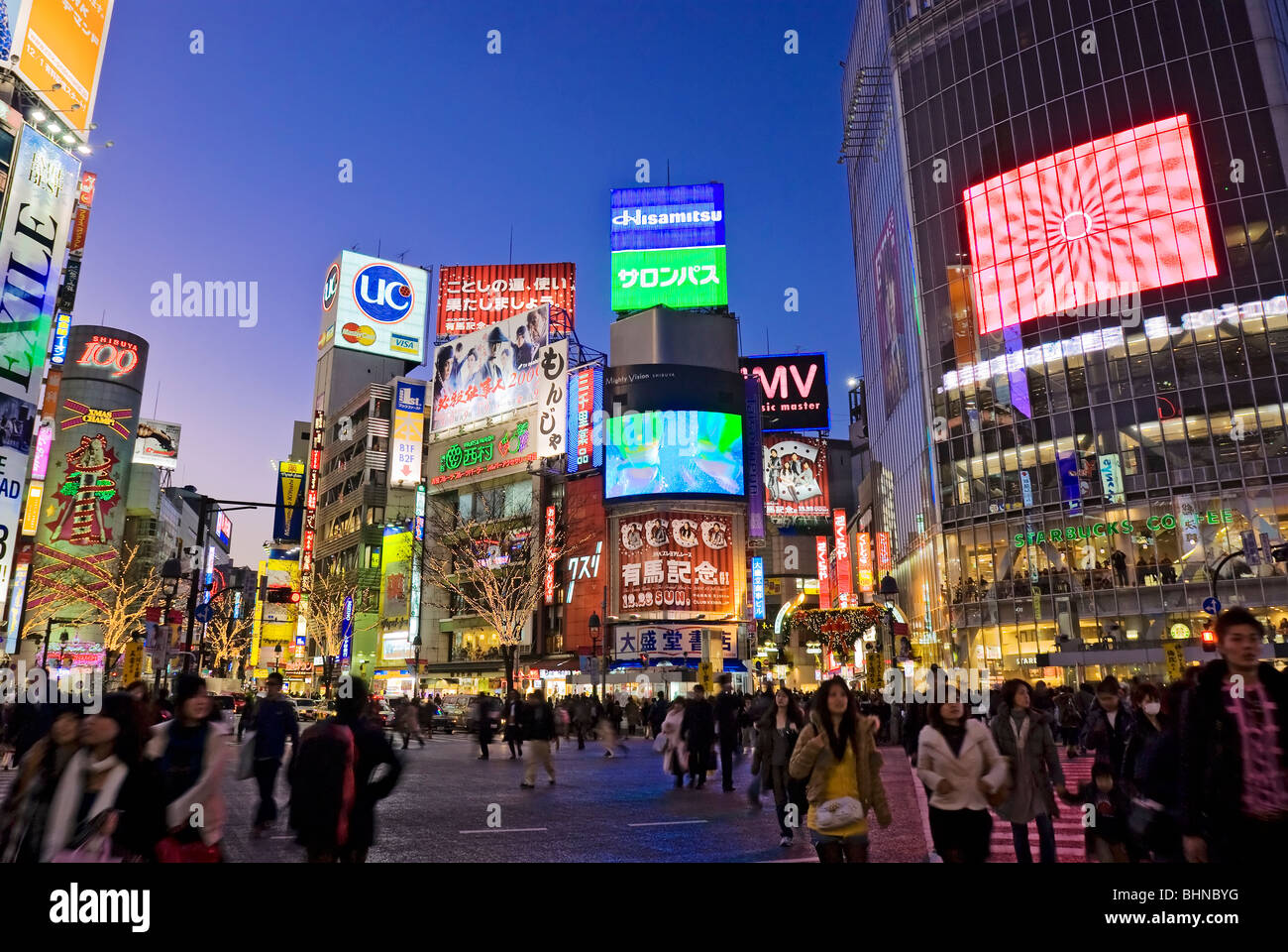 Tokyo Shibuya Crossing, Hachiko Square, Japan, Neon Advertising Billboards. Stock Photo