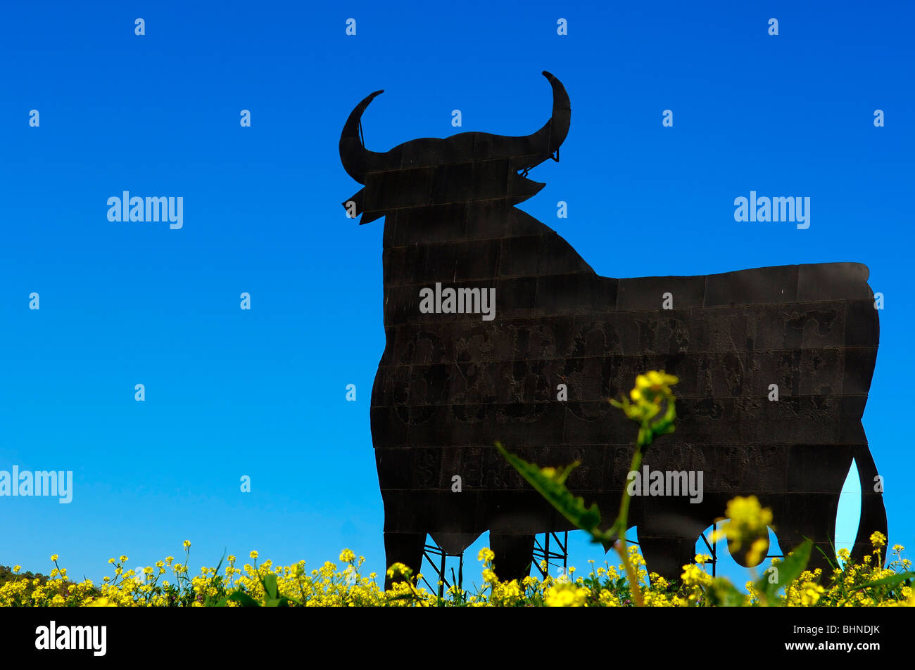 Bull silhouette, typical advertising of Spanish sherry Osborne. Malaga. Andalusia, Spain Stock Photo