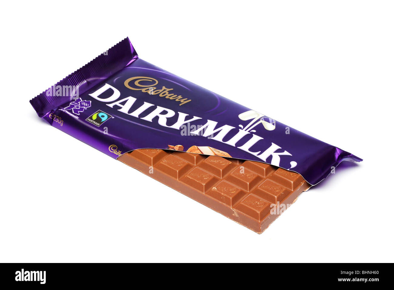 Cadbury's Dairy Milk chocolate bar in torn foil wrapper cutout Stock Photo