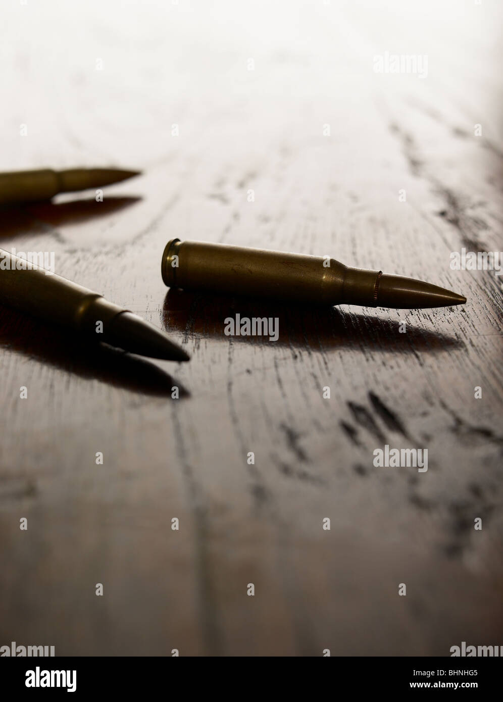 bullets on a table top Stock Photo