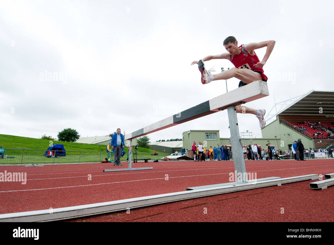 High jump on running track Stock Photo Alamy
