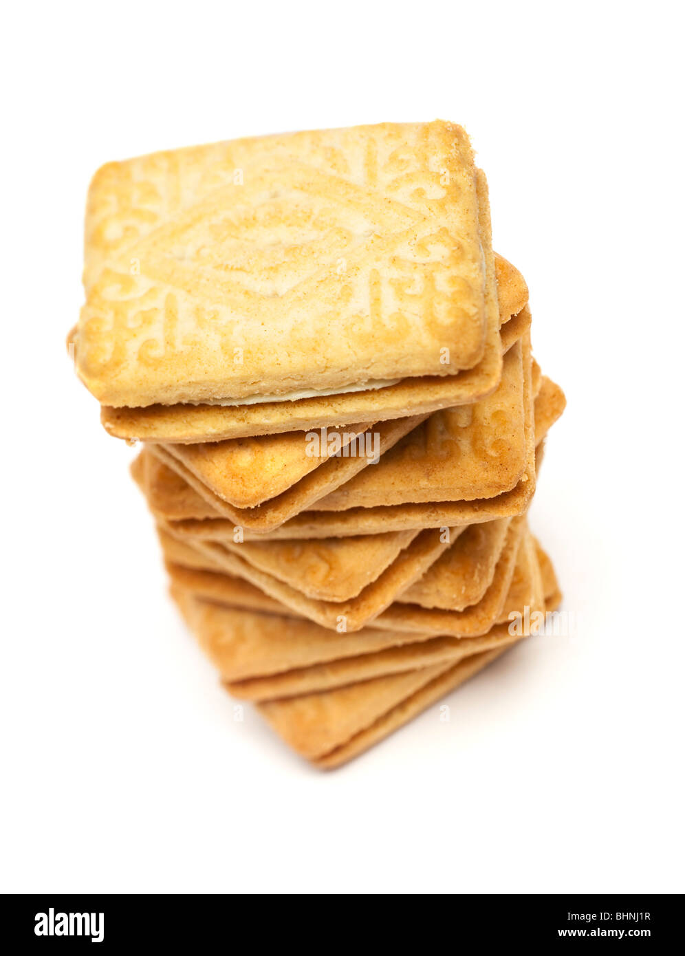 Stack of Custard Cream biscuits - selective focus Stock Photo