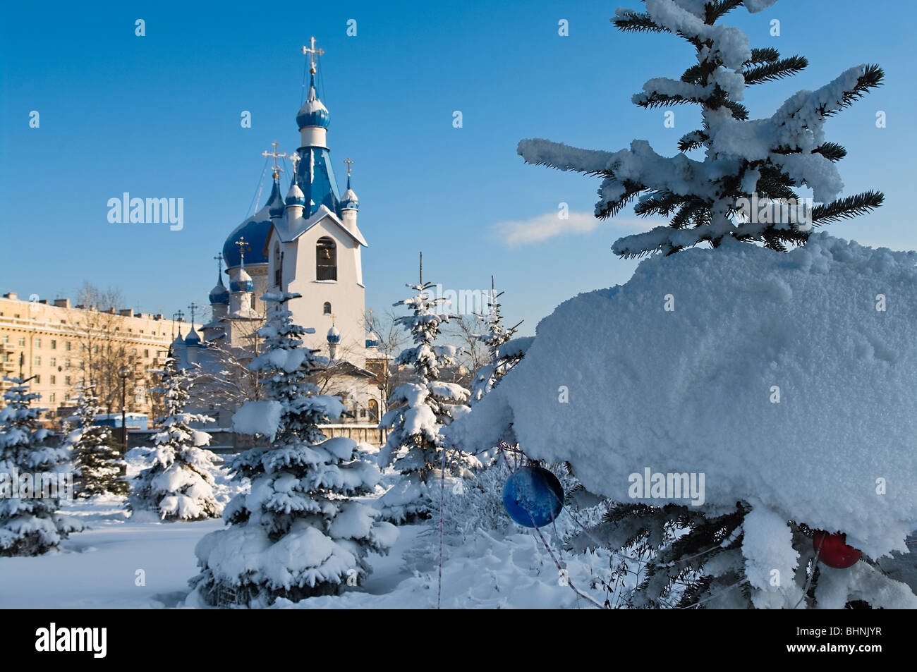 Russian Orthodox Church in St. Petersburg city under white snow. Winter