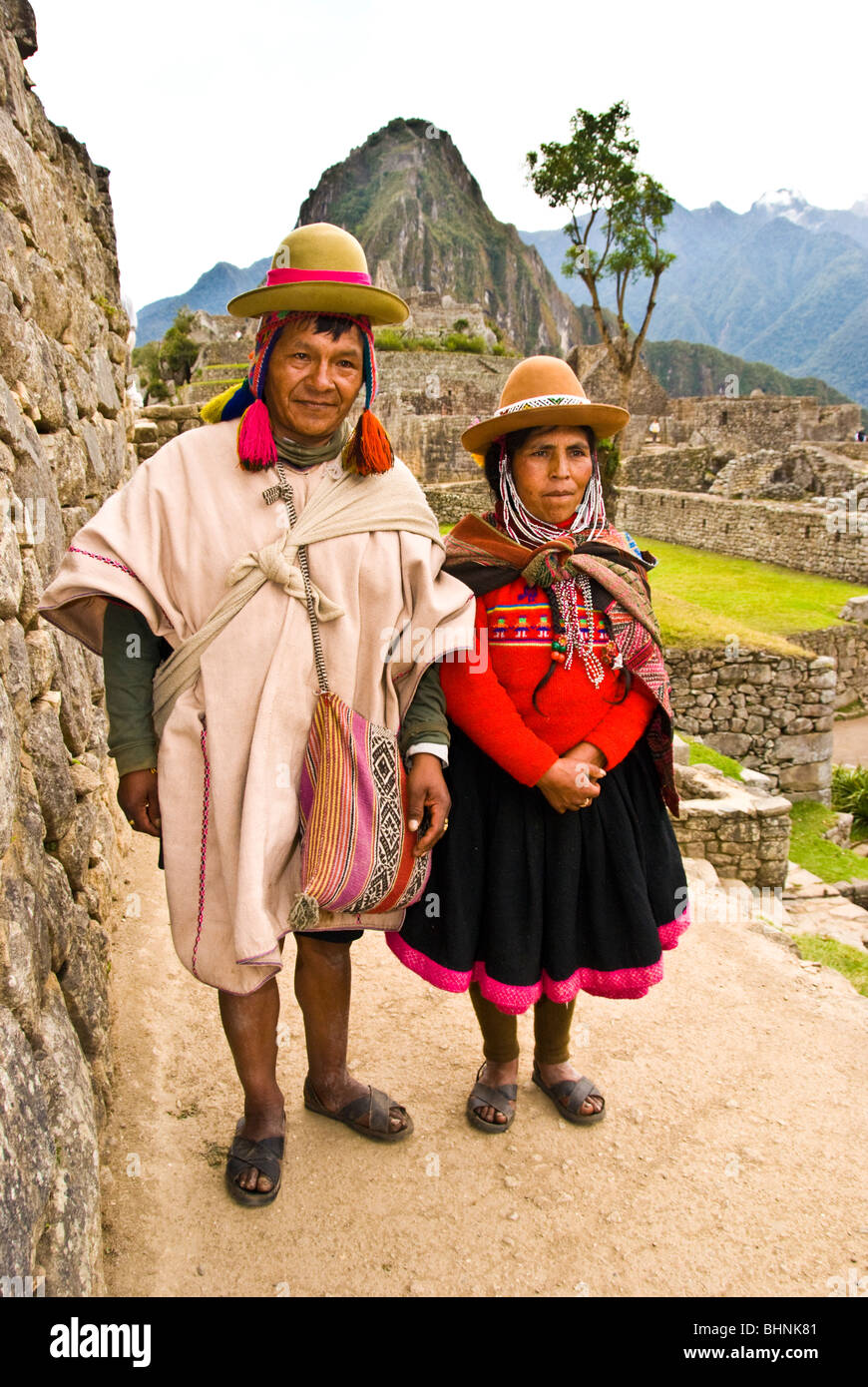 Machu Picchu, Peru,indigenous Indian man and woman, South America Stock Photo