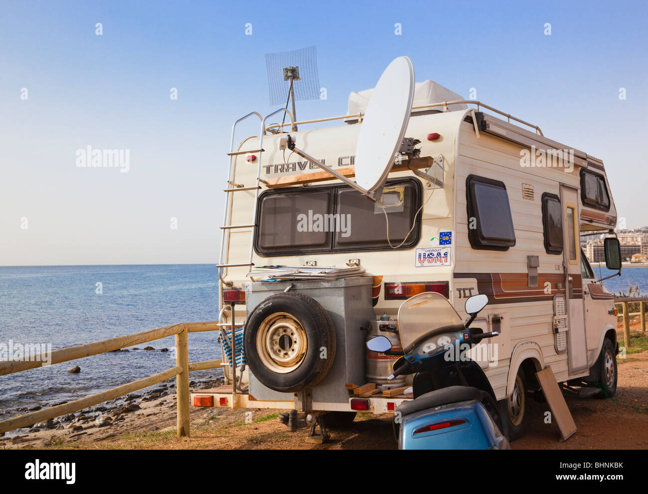 Camper van parked beside sea near La Cala de Mijas, Costa del Sol, Malaga Province, Spain. Stock Photo