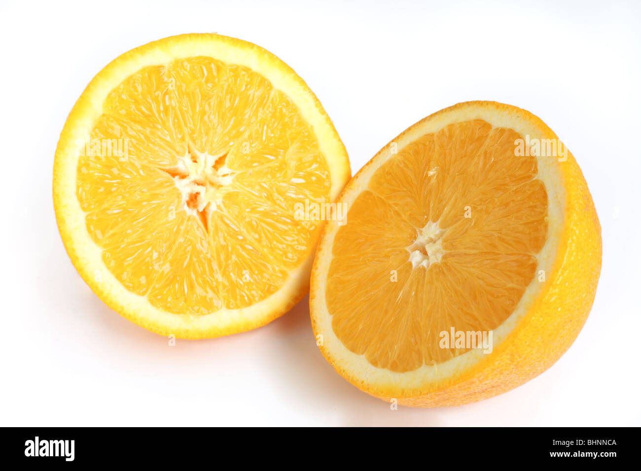 The two halves of a navel orange, ready for juicing Stock Photo Alamy