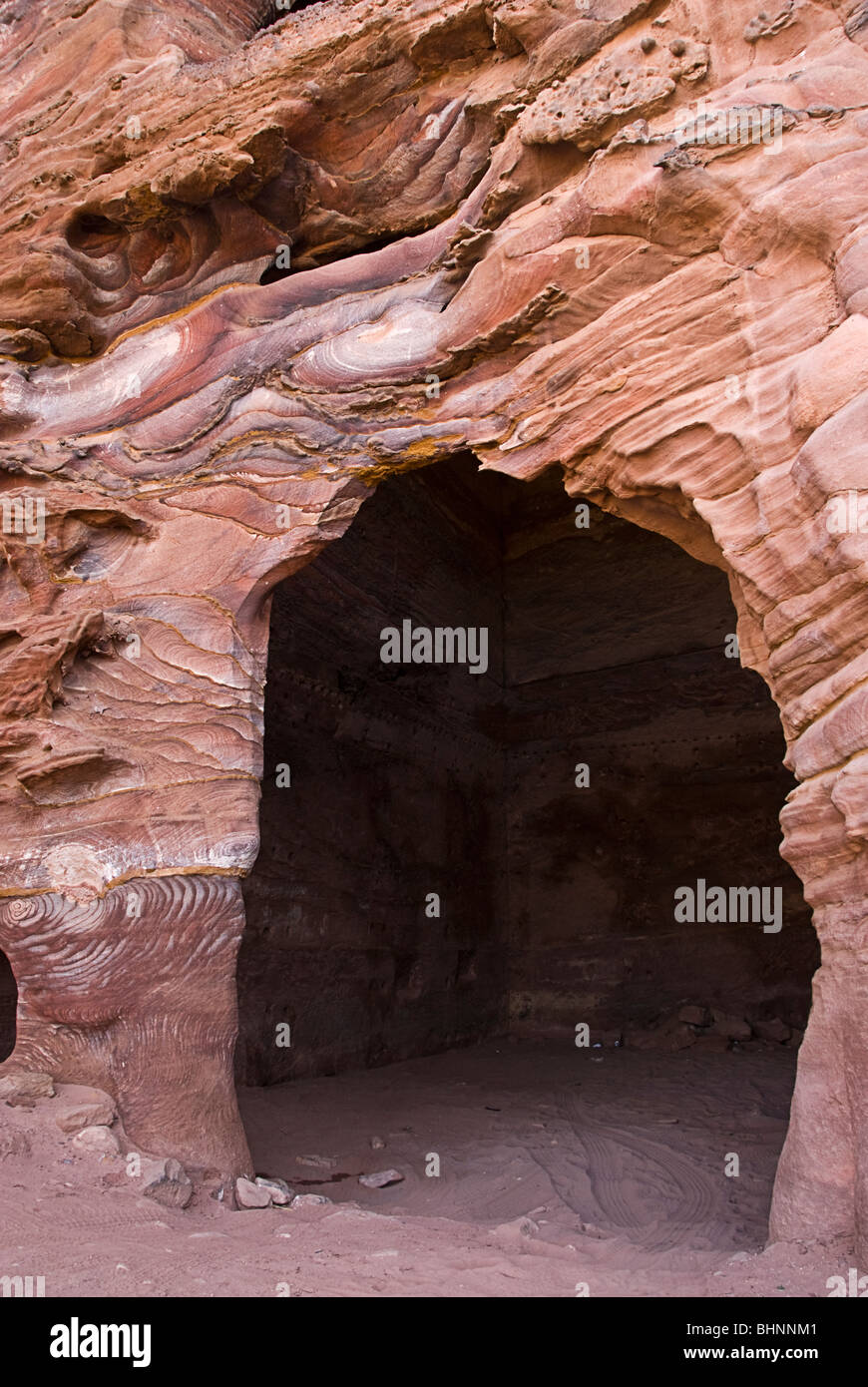 One of the many buildings carved on the rock in Petra, Jordan, Asia. Stock Photo
