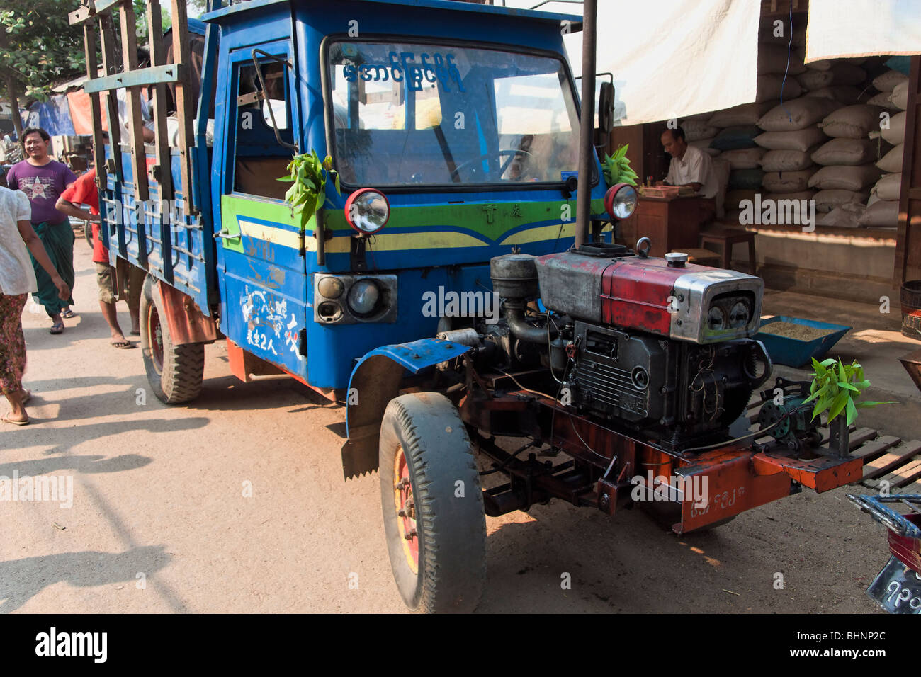 Tractor on the streets in Myanmar Stock Photo Alamy