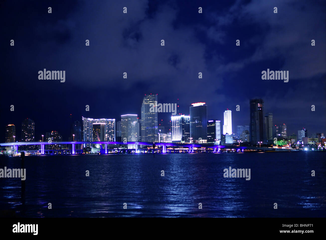 Miami downtown night water city reflexion urban skyline Stock Photo