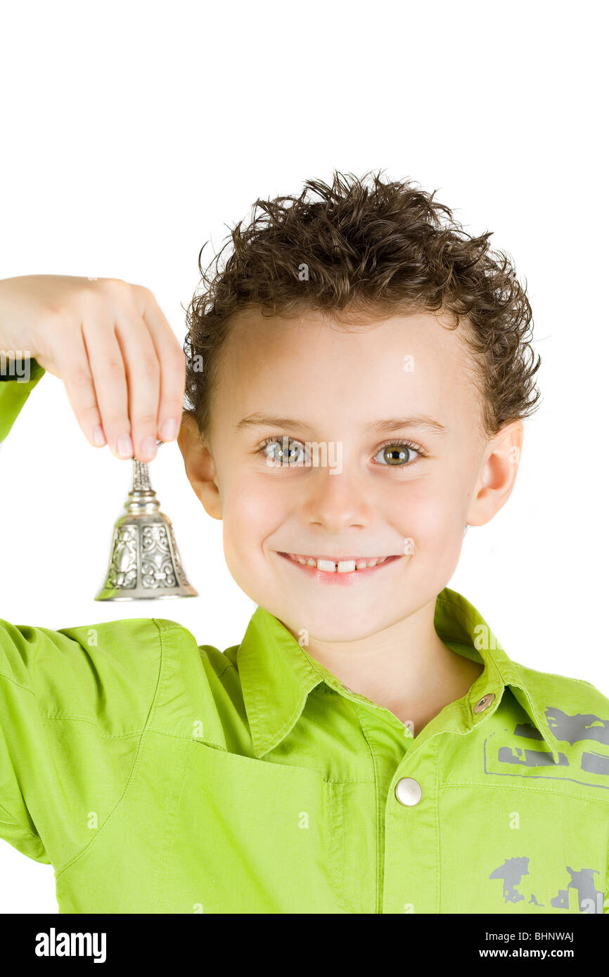 Beautiful boy ringing a bell, isolated on white Stock Photo Alamy