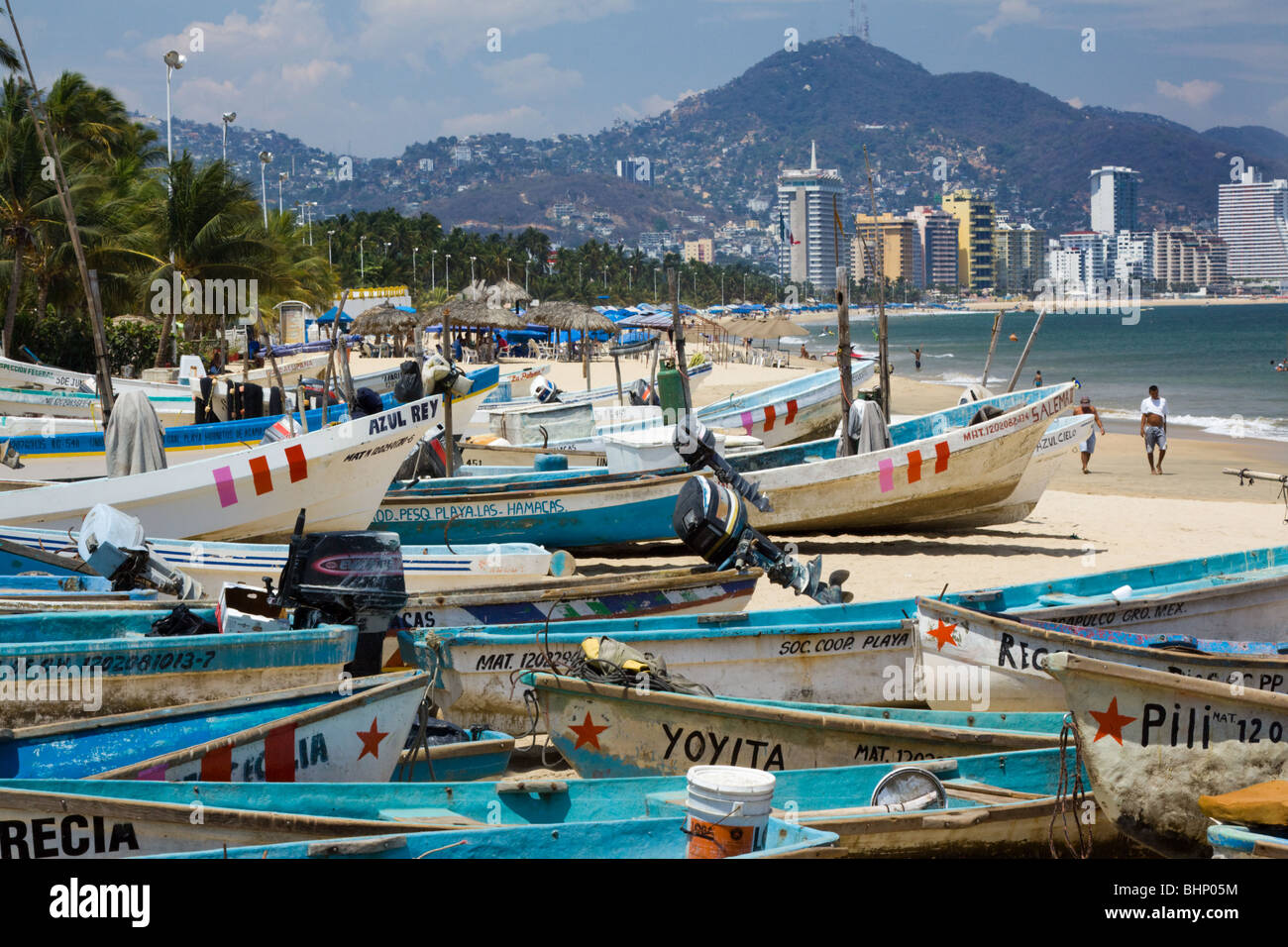 Acapulco Beach with many fishing boats and hotels, Mexico Stock Photo