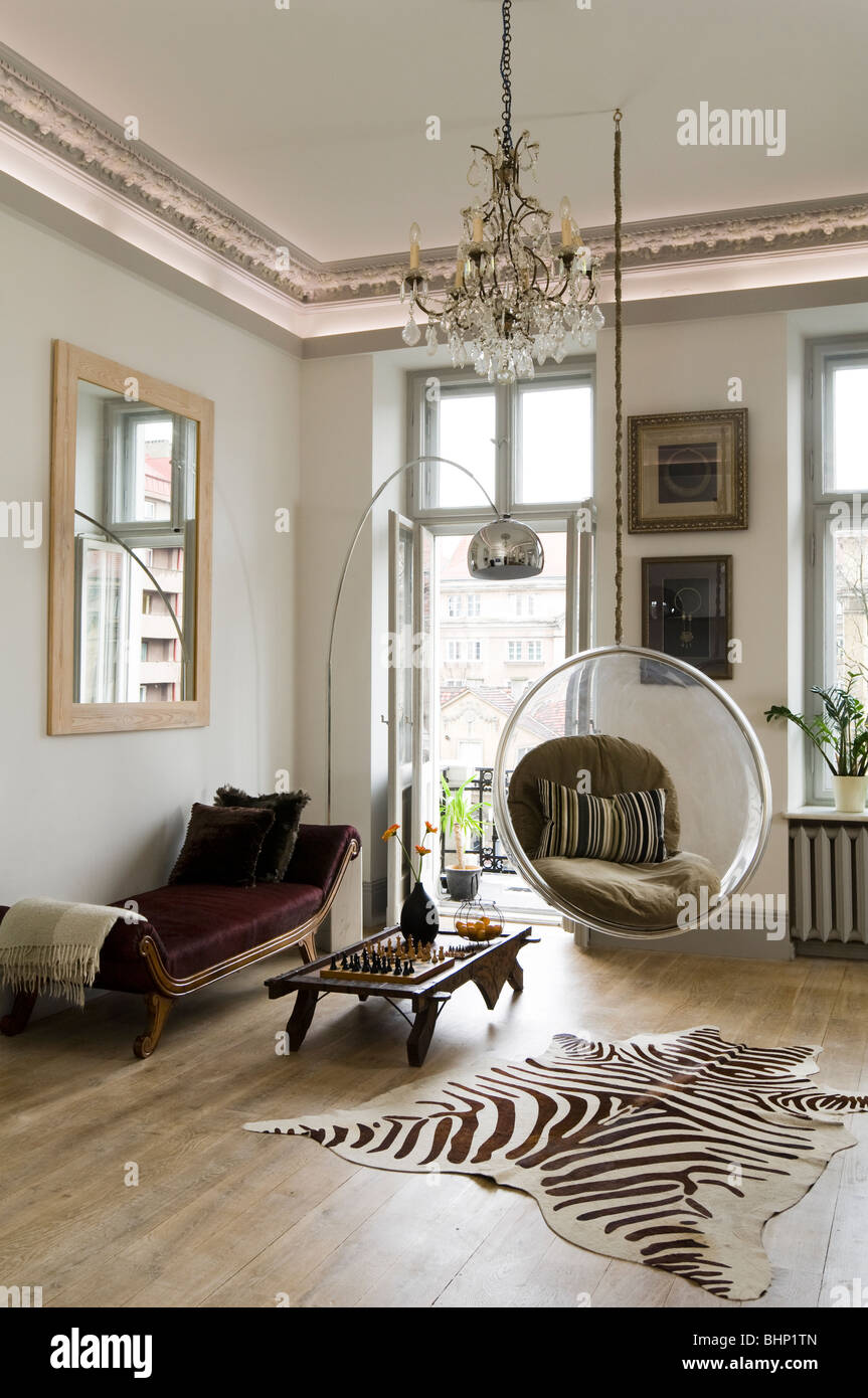 Eero Aarnio bubble chair in living room with zebra skin