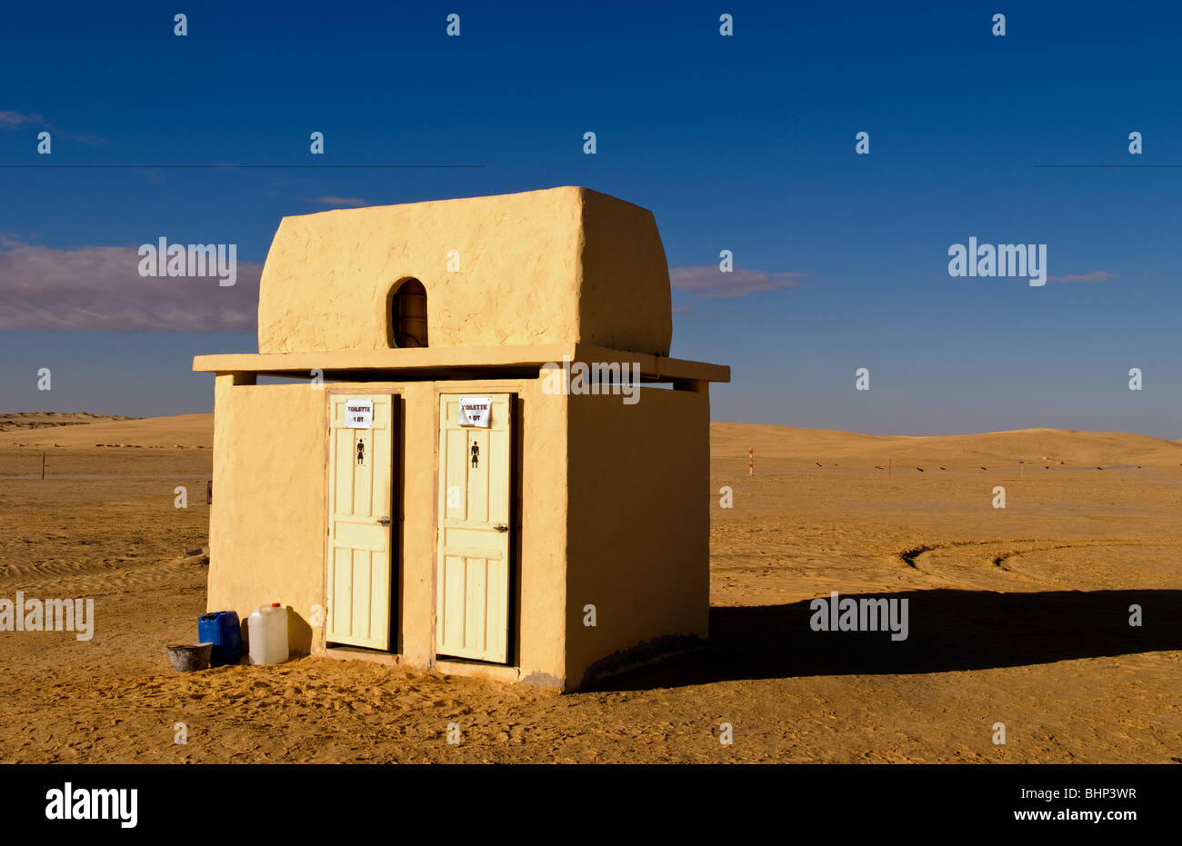 Toilets in the middle of nowhere at famous movie set of Star Wars movies in Sahara Desert near Tozeur Tunisia with his and hers Stock Photo